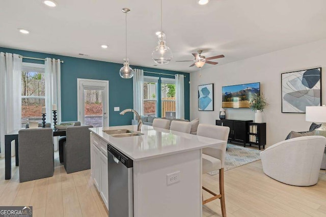 377 Navigator Ln, Mcdonough, GA 30253 - kitchen with open floor plan, a sink, stainless steel dishwasher, light wood-type flooring, and recessed lighting