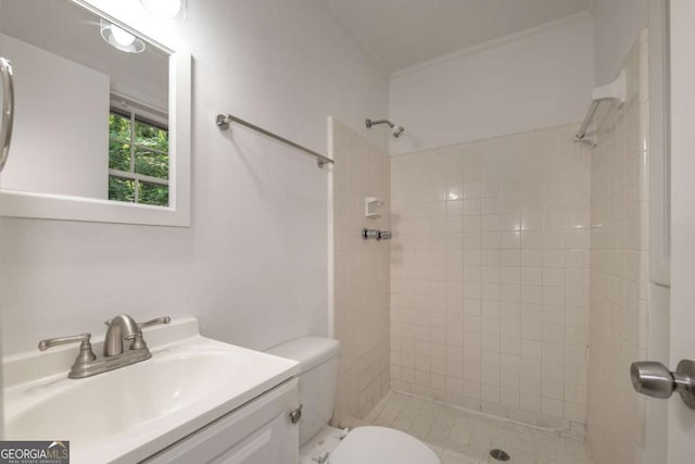 1671 Drayton Woods Dr, Tucker, GA 30084 - full bathroom with crown molding, a tile shower, toilet, and vanity