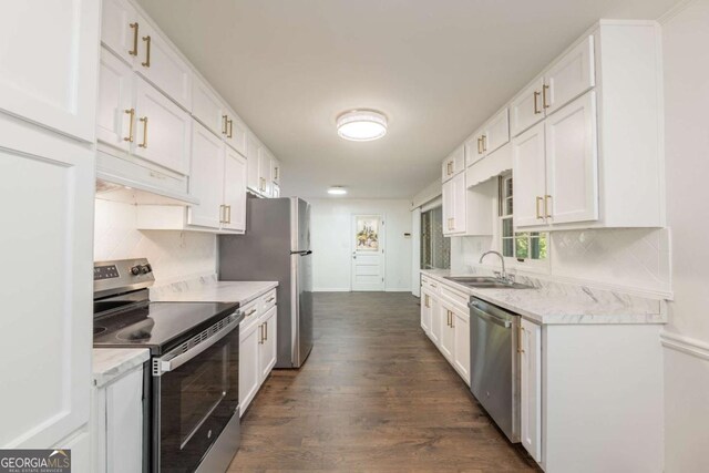 1671 Drayton Woods Dr, Tucker, GA 30084 - kitchen with appliances with stainless steel finishes, a sink, white cabinetry, and dark wood-style floors