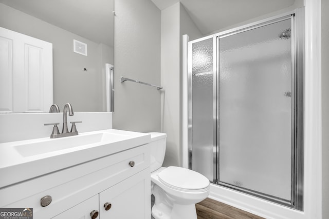 211 N Ave Unit 1122, Athens, GA 30601 - full bath featuring a shower stall, vanity, and wood finished floors