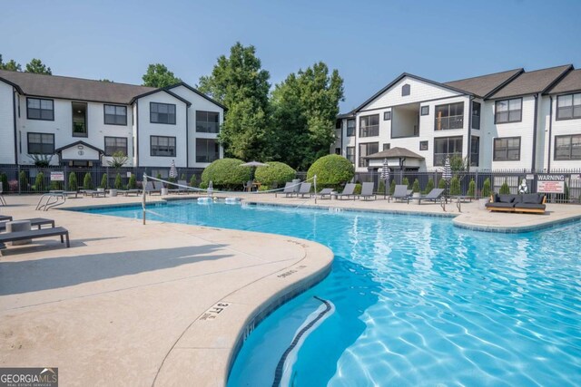 211 N Ave Unit 1122, Athens, GA 30601 - community pool with a patio area