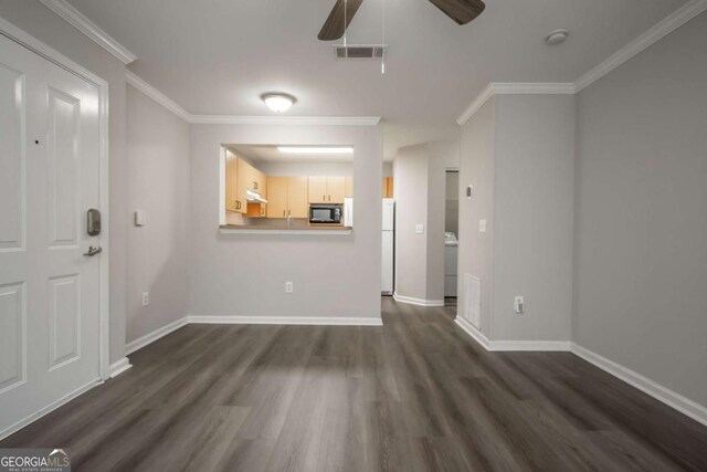 211 N Ave Unit 1122, Athens, GA 30601 - unfurnished living room featuring dark wood-style flooring, a ceiling fan, crown molding, baseboards, and washer / dryer