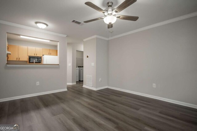 211 N Ave Unit 1122, Athens, GA 30601 - unfurnished living room featuring a ceiling fan, dark wood-style flooring, crown molding, baseboards, and independent washer and dryer