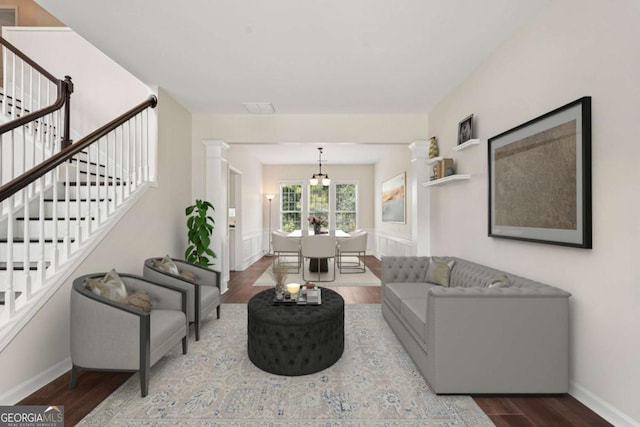 153 Towey Trl, Woodstock, GA 30188 - living area with wood finished floors, stairs, and baseboards