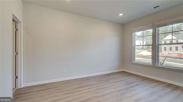 308 Delta Dr, Mcdonough, GA 30253 - unfurnished room with light wood finished floors, baseboards, and recessed lighting