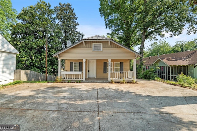 206 Brown St, Carrollton, GA 30117 - bungalow featuring a porch and board and batten siding