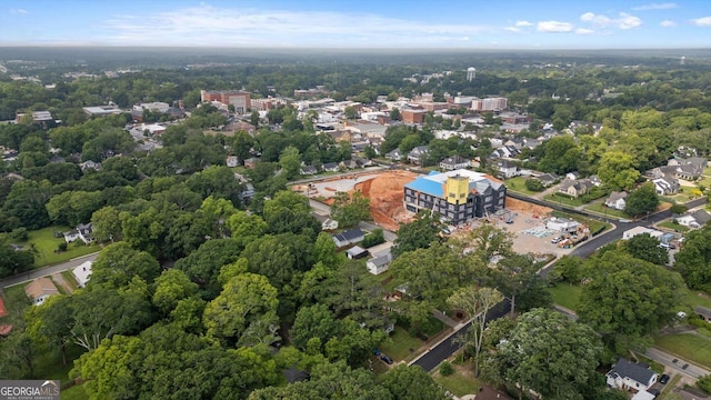 206 Brown St, Carrollton, GA 30117 - aerial view of property and surrounding area with a heavily wooded area