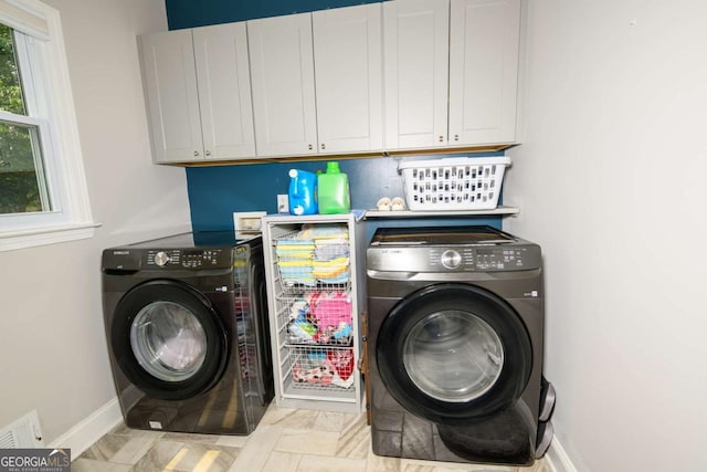1409 Echo Mill Dr, Powder Springs, GA 30127 - laundry area featuring cabinet space, independent washer and dryer, and baseboards