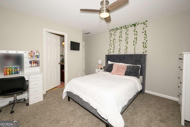 1409 Echo Mill Dr, Powder Springs, GA 30127 - bedroom with carpet, ceiling fan, a desk, and baseboards