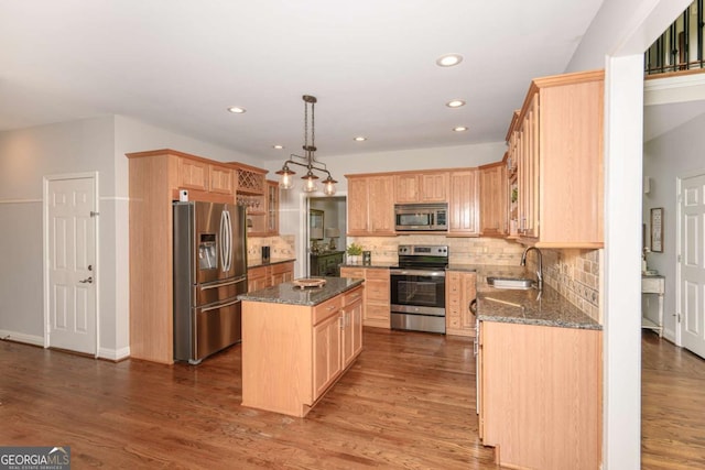 1409 Echo Mill Dr, Powder Springs, GA 30127 - kitchen featuring appliances with stainless steel finishes, a sink, light brown cabinetry, and recessed lighting