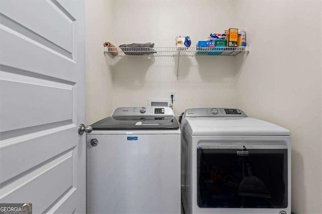 5880 Garden Cir, Douglasville, GA 30135 - washroom featuring washer and clothes dryer