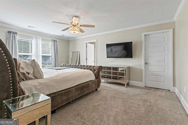 5880 Garden Cir, Douglasville, GA 30135 - carpeted bedroom with ornamental molding, baseboards, and a ceiling fan