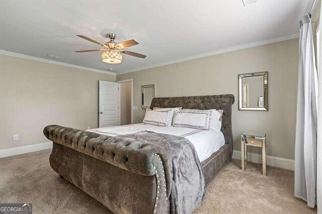 5880 Garden Cir, Douglasville, GA 30135 - carpeted bedroom featuring crown molding, baseboards, and ceiling fan