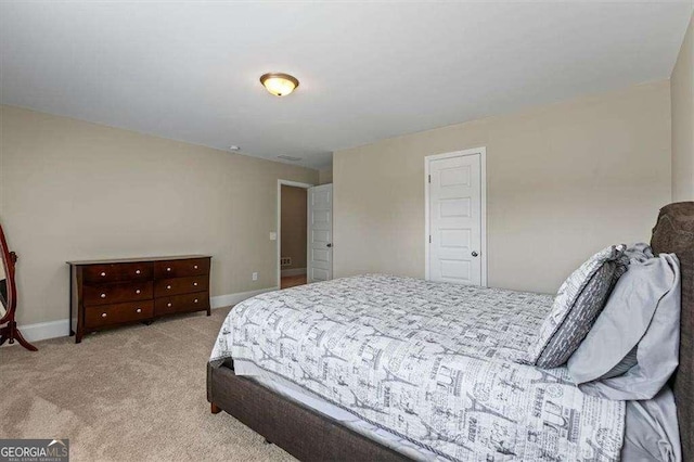 5880 Garden Cir, Douglasville, GA 30135 - bedroom with carpet flooring and baseboards