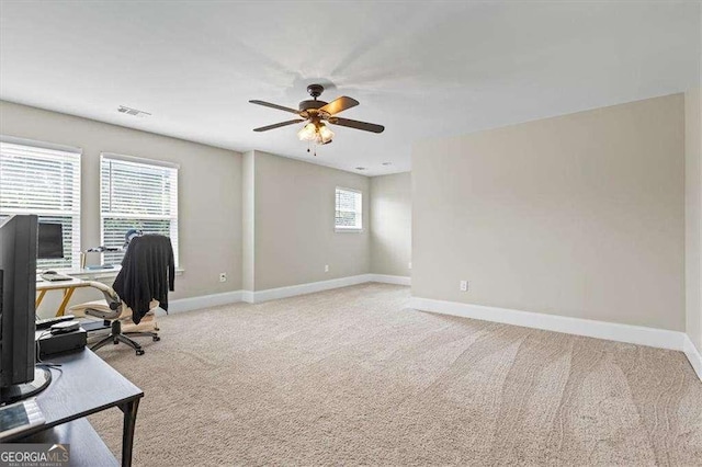 5880 Garden Cir, Douglasville, GA 30135 - home office featuring baseboards, ceiling fan, and light colored carpet