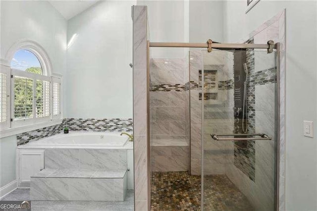 511 Pine Valley Rd SE, Marietta, GA 30067 - full bathroom featuring a garden tub and a shower stall