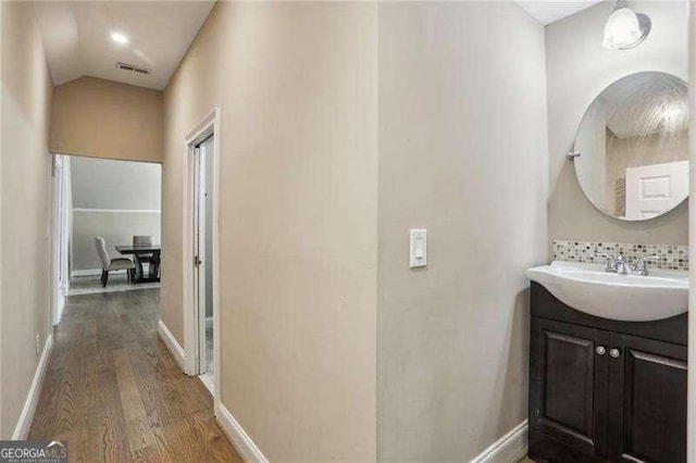 511 Pine Valley Rd SE, Marietta, GA 30067 - hallway with a sink and wood finished floors