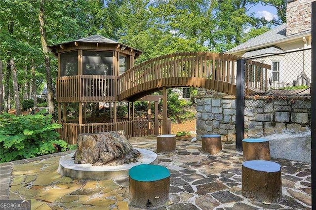 511 Pine Valley Rd SE, Marietta, GA 30067 - view of patio with stairway and a sunroom