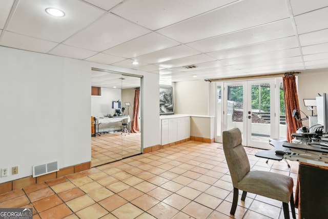 511 Pine Valley Rd SE, Marietta, GA 30067 - home office with light tile patterned flooring, french doors, and a drop ceiling