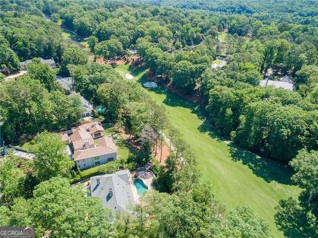 511 Pine Valley Rd SE, Marietta, GA 30067 - aerial view of property and surrounding area with a heavily wooded area