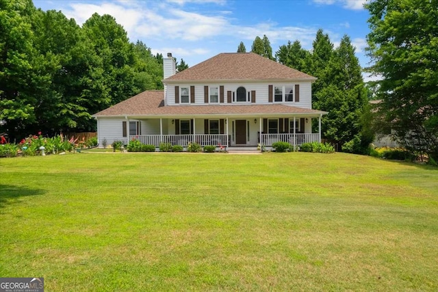 2820 Channing Way, Cumming, GA 30040 - farmhouse inspired home with covered porch, a chimney, and a front yard