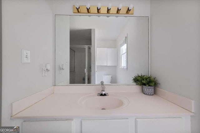 2820 Channing Way, Cumming, GA 30040 - bathroom featuring a stall shower, vanity, and toilet
