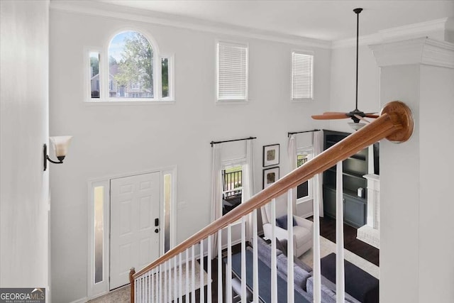 2820 Channing Way, Cumming, GA 30040 - entryway featuring crown molding, stairway, and plenty of natural light