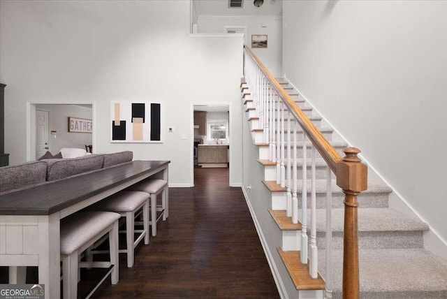 2820 Channing Way, Cumming, GA 30040 - staircase with a towering ceiling, wood finished floors, and baseboards