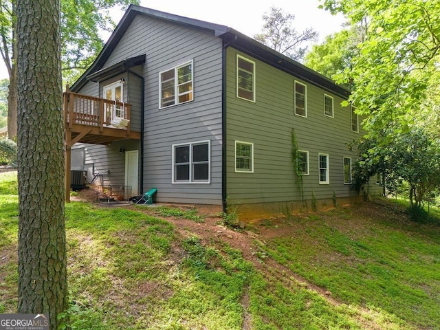 2674 Skylane Dr, Marietta, GA 30062 - rear view of property with a lawn