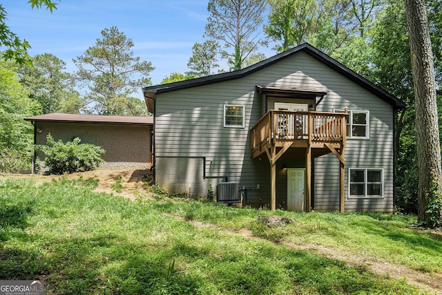 2674 Skylane Dr, Marietta, GA 30062 - back of house featuring a lawn and a deck