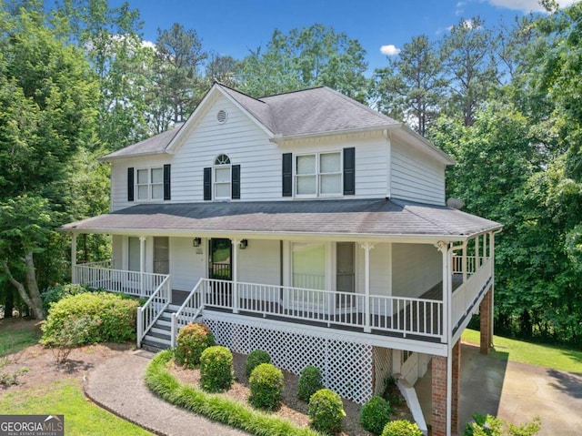 308 Golden Ct, Canton, GA 30114 - farmhouse with covered porch and a shingled roof