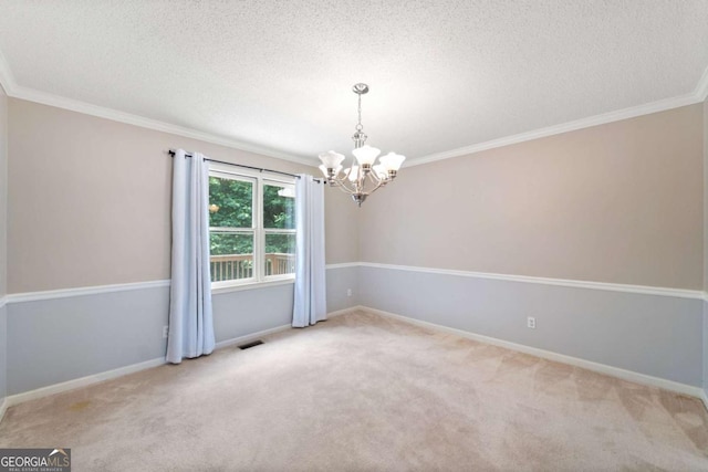 308 Golden Ct, Canton, GA 30114 - carpeted empty room featuring a chandelier, a textured ceiling, ornamental molding, and baseboards
