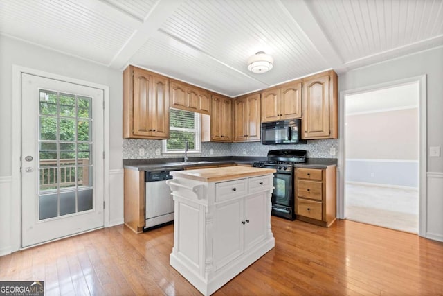 308 Golden Ct, Canton, GA 30114 - kitchen with black appliances, wood counters, decorative backsplash, a sink, and light wood-style flooring