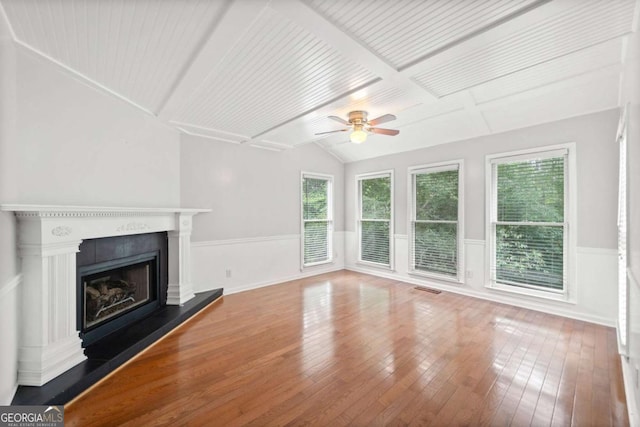 308 Golden Ct, Canton, GA 30114 - unfurnished living room with hardwood / wood-style flooring, wainscoting, ceiling fan, a fireplace with raised hearth, and wooden ceiling