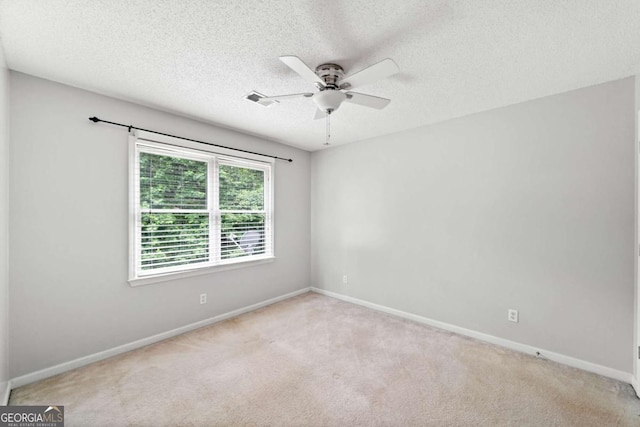 308 Golden Ct, Canton, GA 30114 - unfurnished room with ceiling fan, light carpet, baseboards, and a textured ceiling