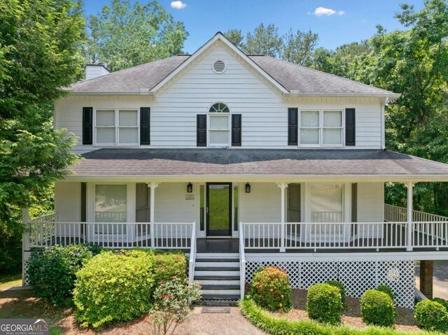 308 Golden Ct, Canton, GA 30114 - farmhouse featuring covered porch, roof with shingles, and a chimney