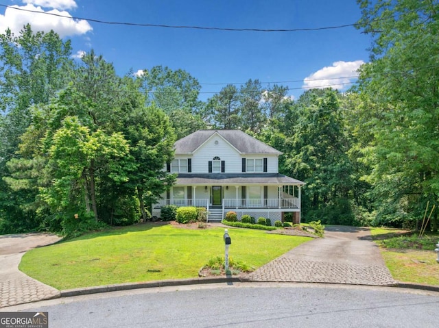 308 Golden Ct, Canton, GA 30114 - view of front of house with a porch, a front lawn, and asphalt driveway