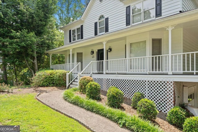 308 Golden Ct, Canton, GA 30114 - farmhouse featuring a porch