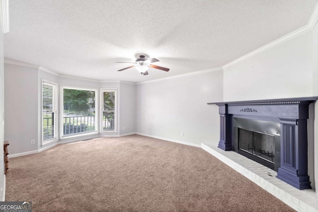 308 Golden Ct, Canton, GA 30114 - unfurnished living room with a ceiling fan, carpet flooring, a textured ceiling, baseboards, and ornamental molding