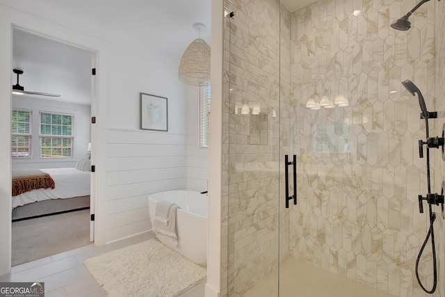 140 S Alexander Creek Rd, Newnan, GA 30263 - full bath featuring a freestanding bath, a stall shower, connected bathroom, tile patterned floors, and ceiling fan
