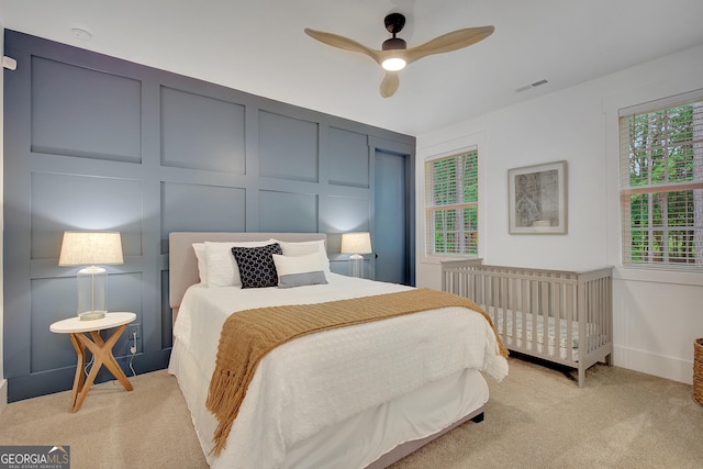140 S Alexander Creek Rd, Newnan, GA 30263 - bedroom featuring a decorative wall, light colored carpet, and ceiling fan