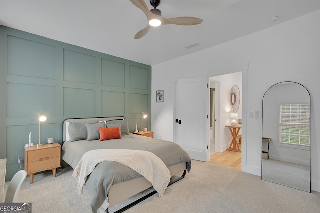 140 S Alexander Creek Rd, Newnan, GA 30263 - bedroom featuring a decorative wall, light colored carpet, and ceiling fan