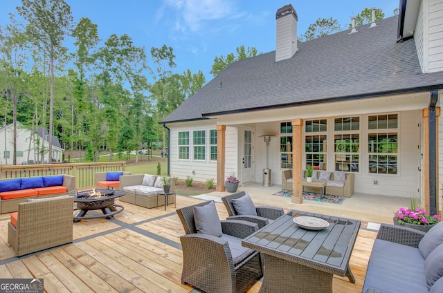 140 S Alexander Creek Rd, Newnan, GA 30263 - deck with an outdoor living space with a fire pit