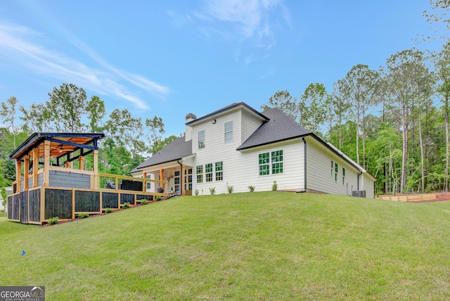 140 S Alexander Creek Rd, Newnan, GA 30263 - back of property with a lawn, a chimney, cooling unit, and roof with shingles