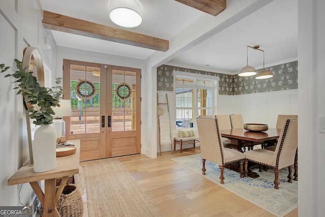 140 S Alexander Creek Rd, Newnan, GA 30263 - entrance foyer with french doors, light wood finished floors, wallpapered walls, beamed ceiling, and a decorative wall