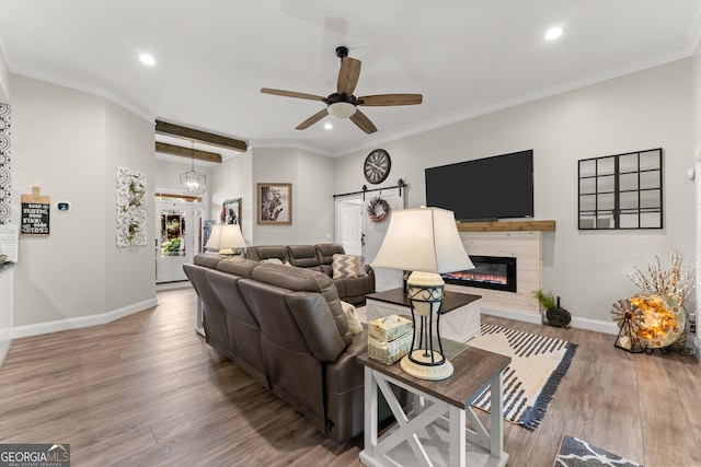 25 Wicklow Ct, Hoschton, GA 30548 - living area with recessed lighting, a ceiling fan, wood finished floors, baseboards, and crown molding