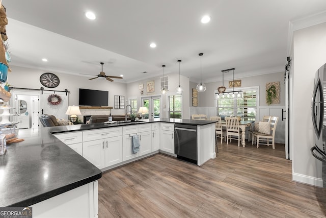 25 Wicklow Ct, Hoschton, GA 30548 - kitchen featuring stainless steel dishwasher, dark countertops, a sink, recessed lighting, and white cabinets