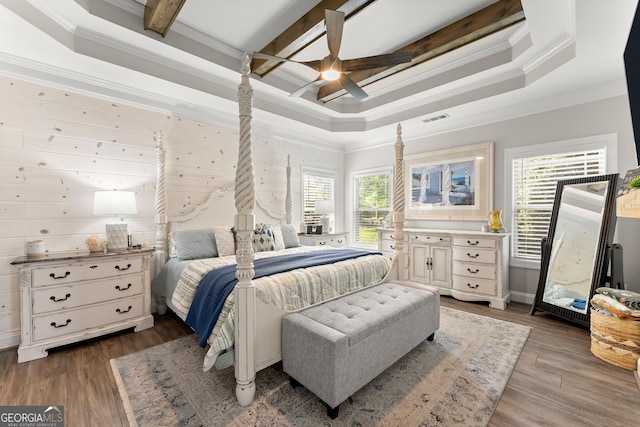 25 Wicklow Ct, Hoschton, GA 30548 - bedroom with crown molding, coffered ceiling, wood finished floors, beam ceiling, and a tray ceiling