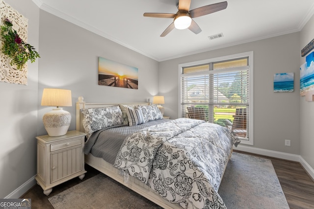 25 Wicklow Ct, Hoschton, GA 30548 - bedroom featuring dark wood-type flooring, baseboards, crown molding, and a ceiling fan