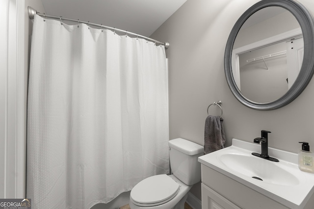 25 Wicklow Ct, Hoschton, GA 30548 - full bath with toilet, vanity, and a shower with curtain